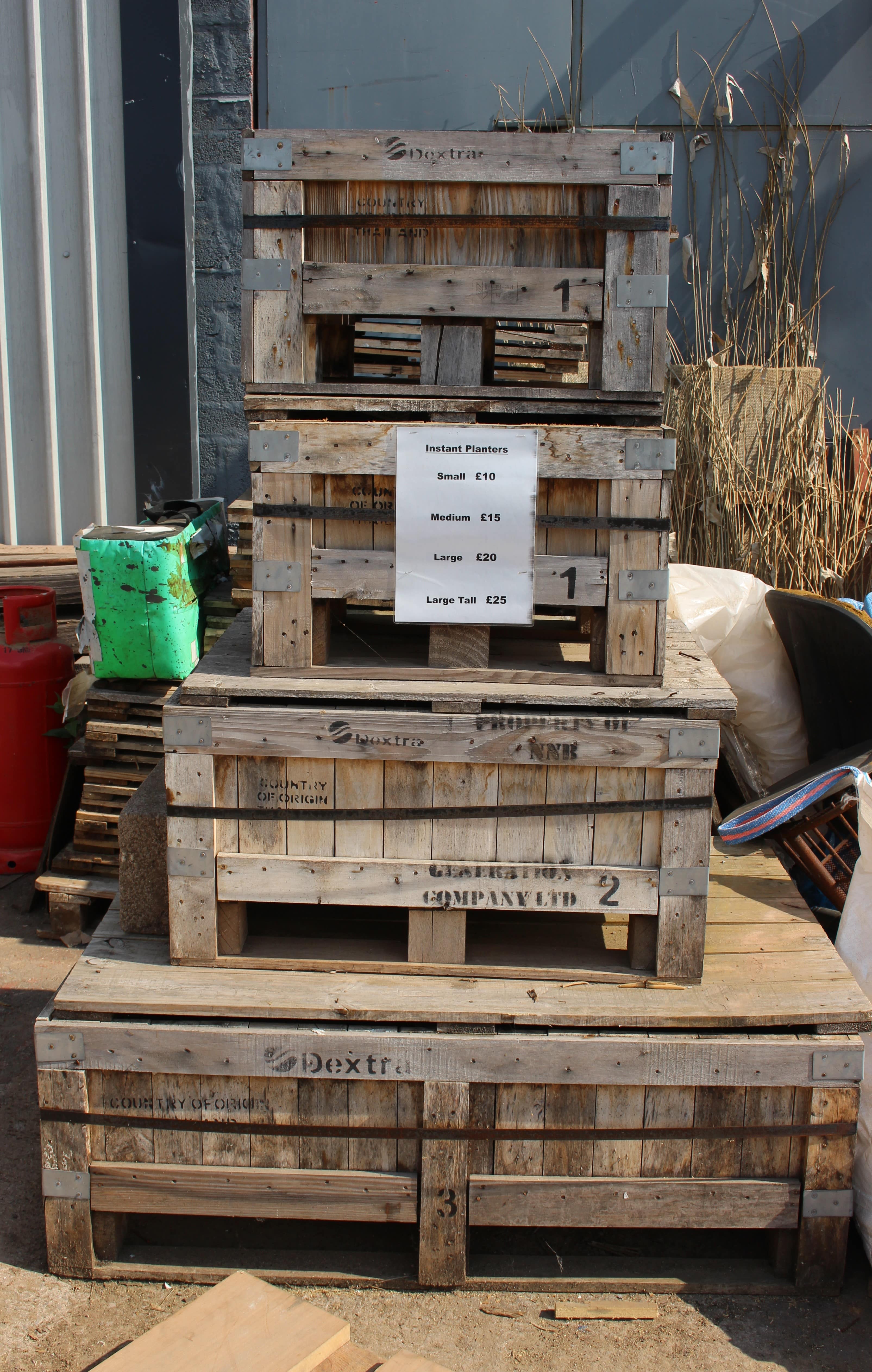 A stack of large and small instant planters